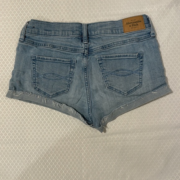 American Eagle Size 0 / 25 soft, light blue jean shorts. Frayed hem - Picture 2 of 5